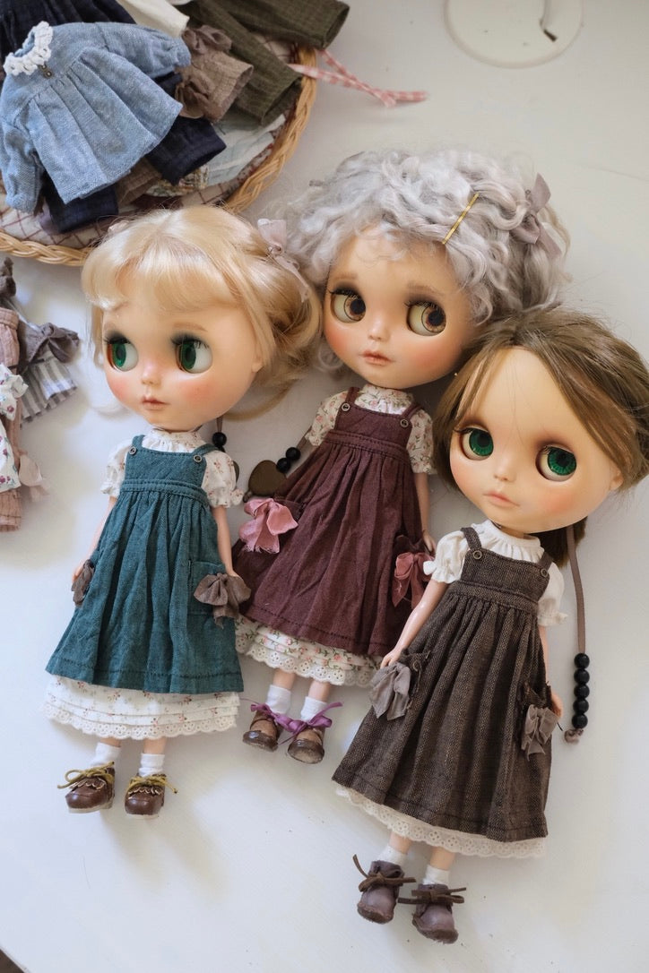 Gathered neck dress and pinafore apron